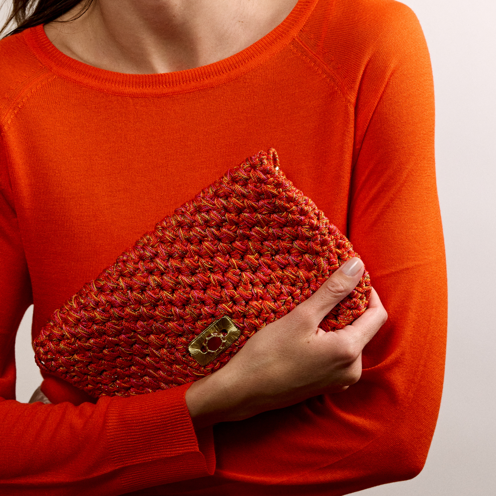 Merrichase woven clutch in coral