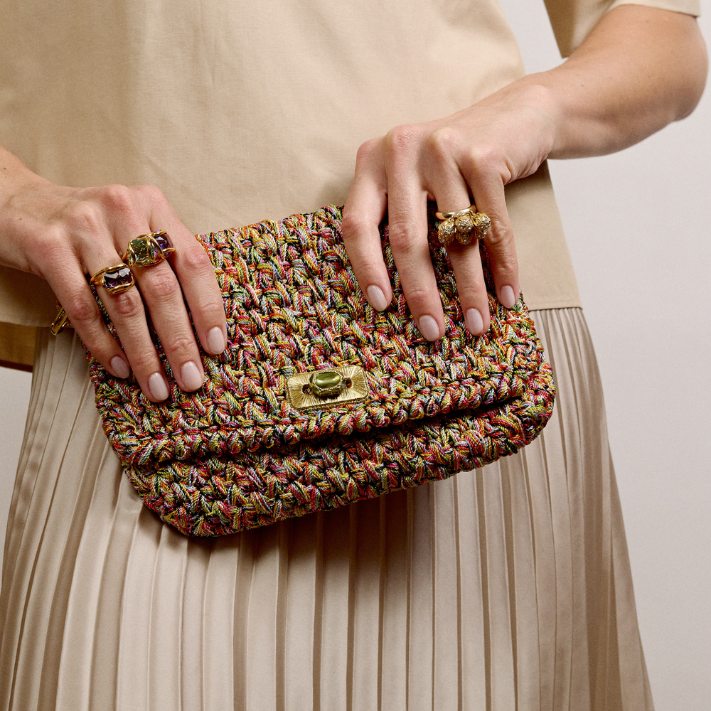 Merrichase Double Beacon Ring in Amethyst and Peridot on model